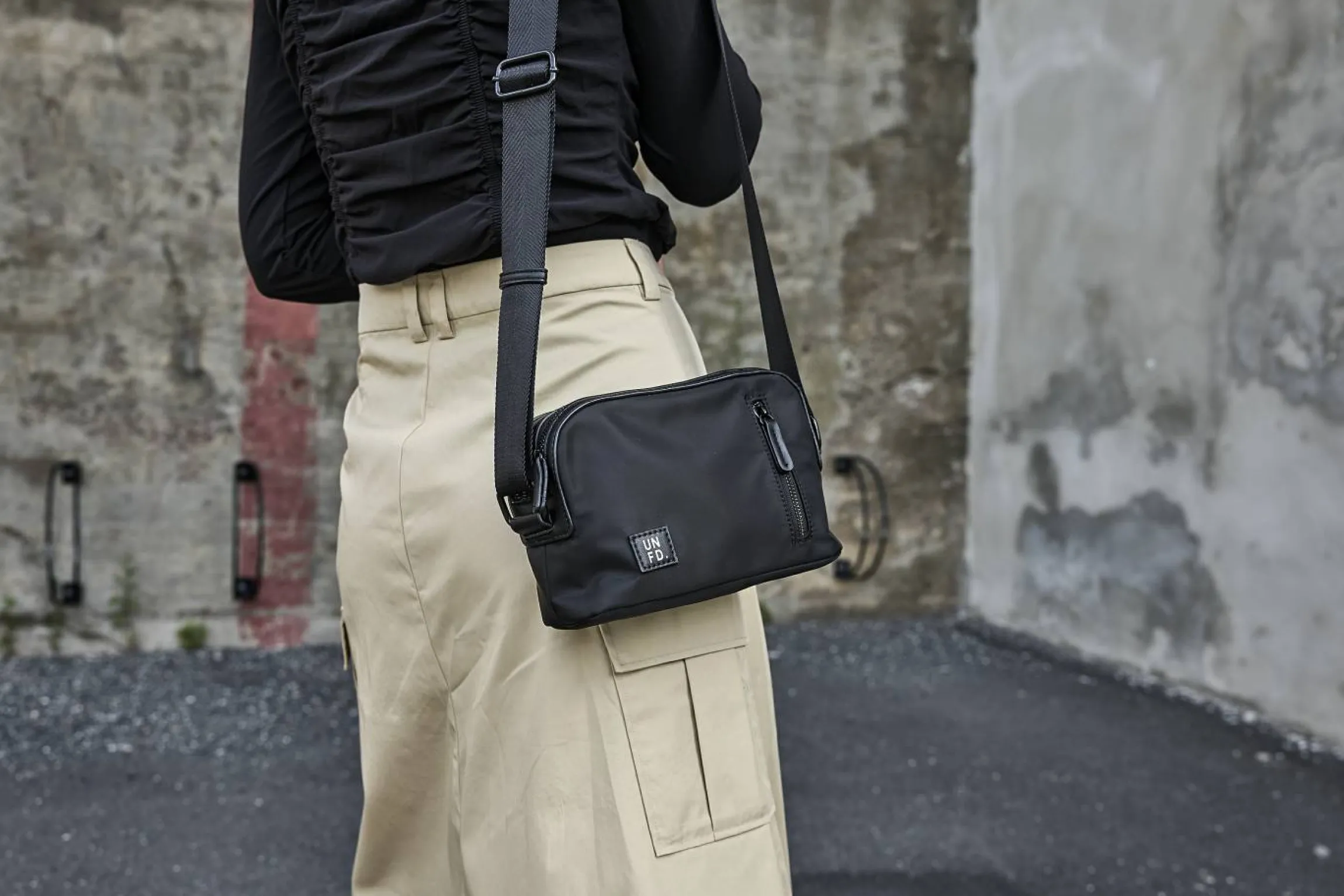 Sportig crossbody-väska