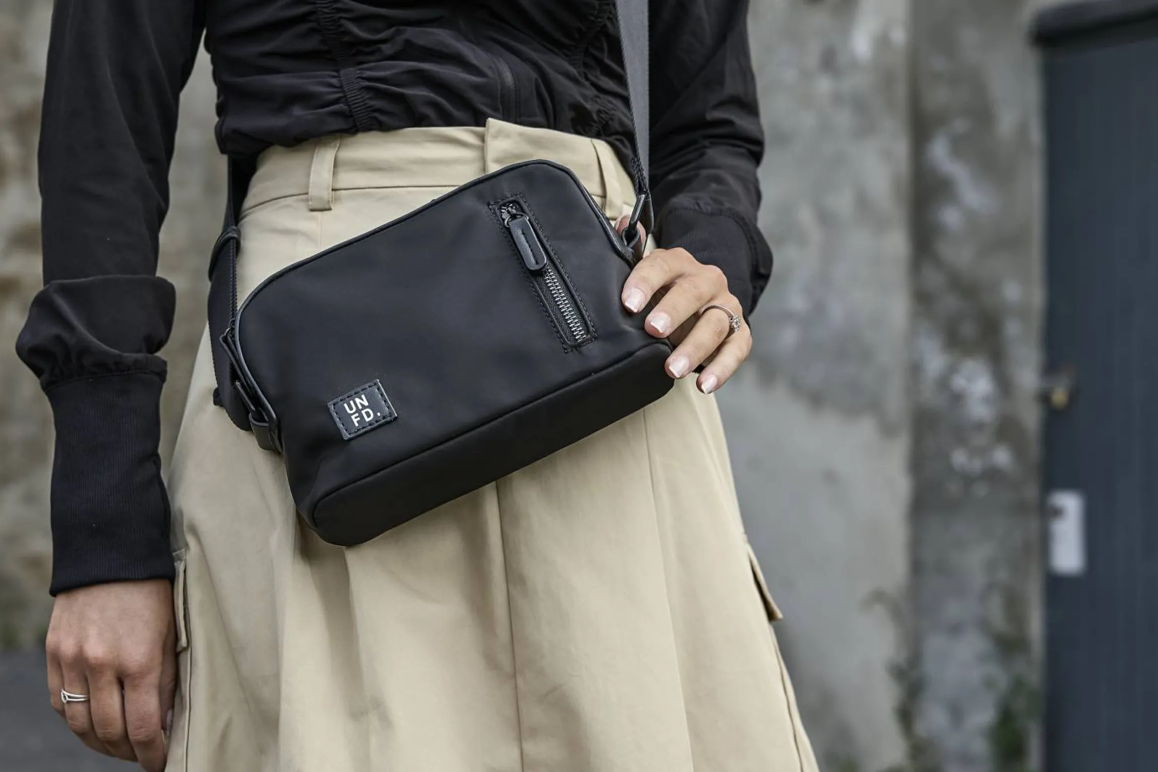 Sportig crossbody-väska